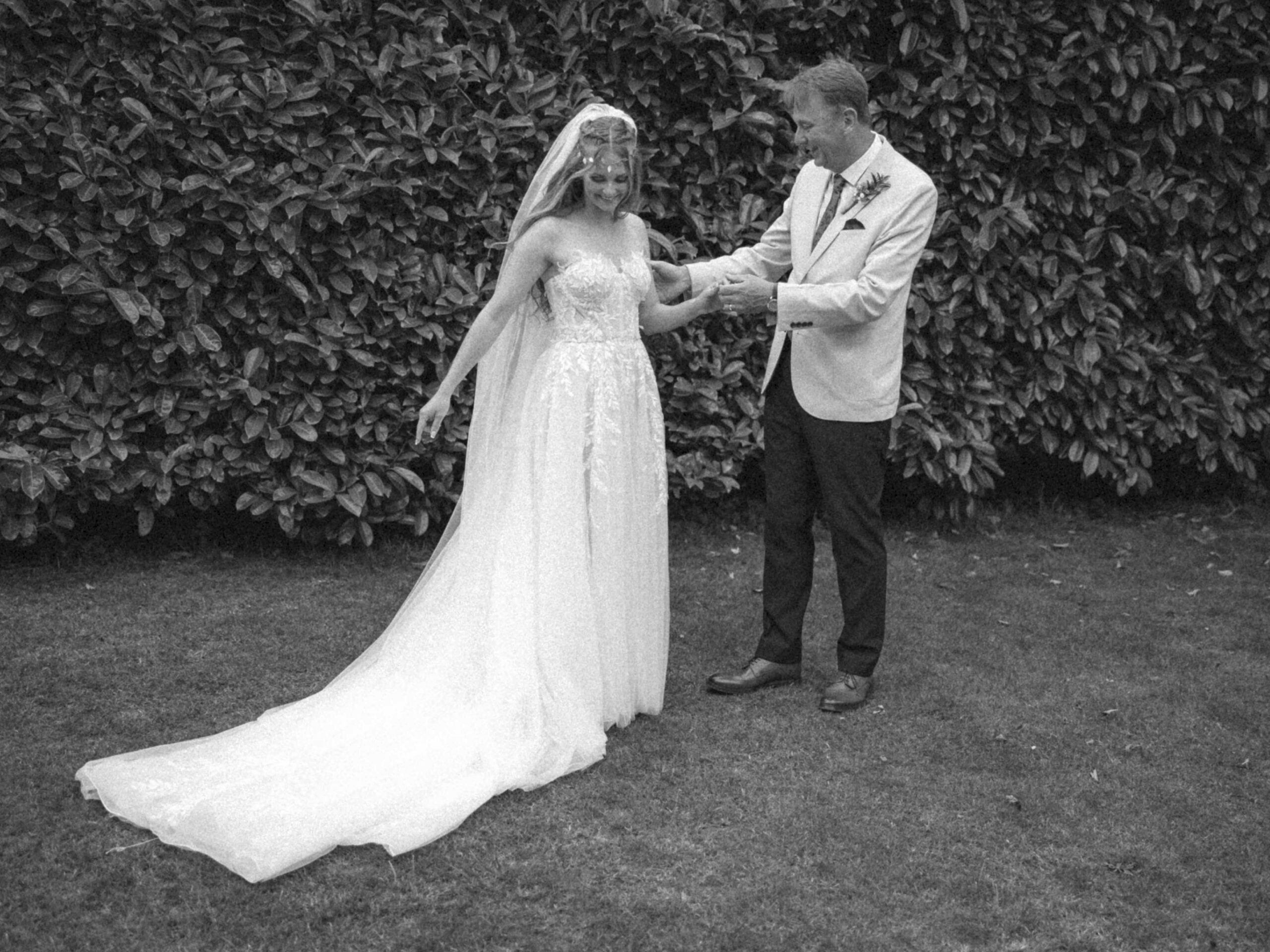 Father of the bride dress reveal black and white