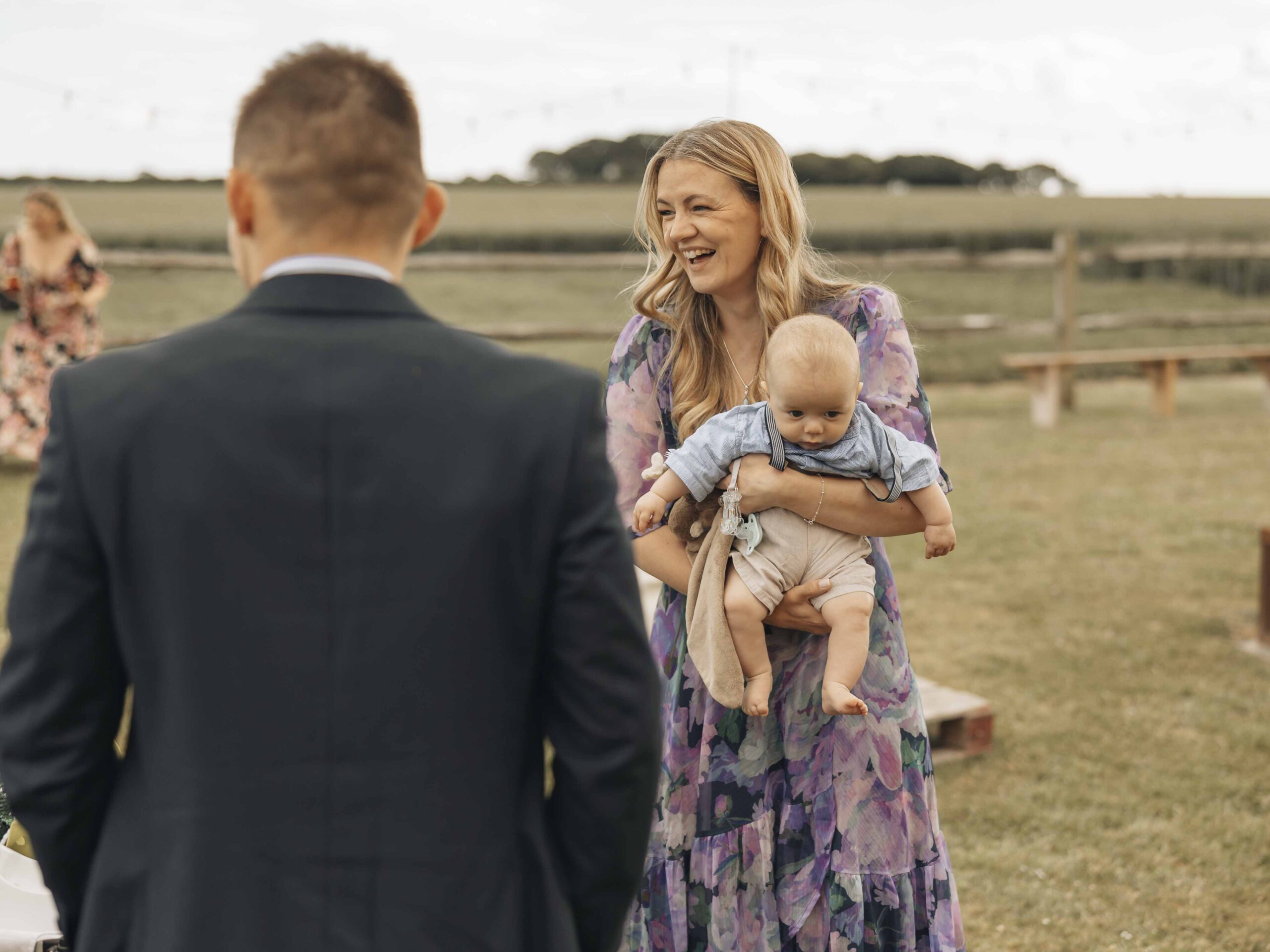 Wedding guest with baby