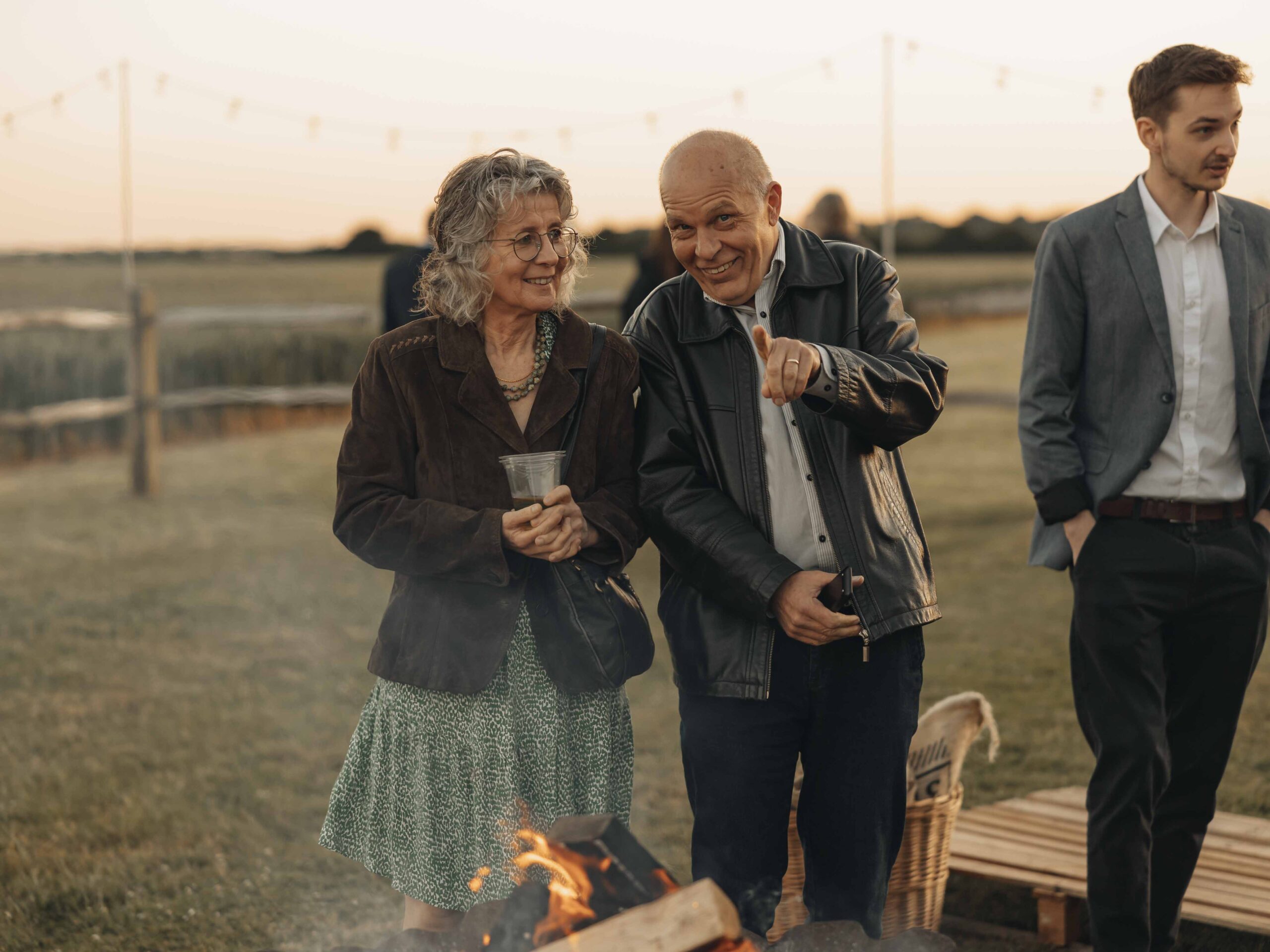 Granddad pointing to camera at wedding