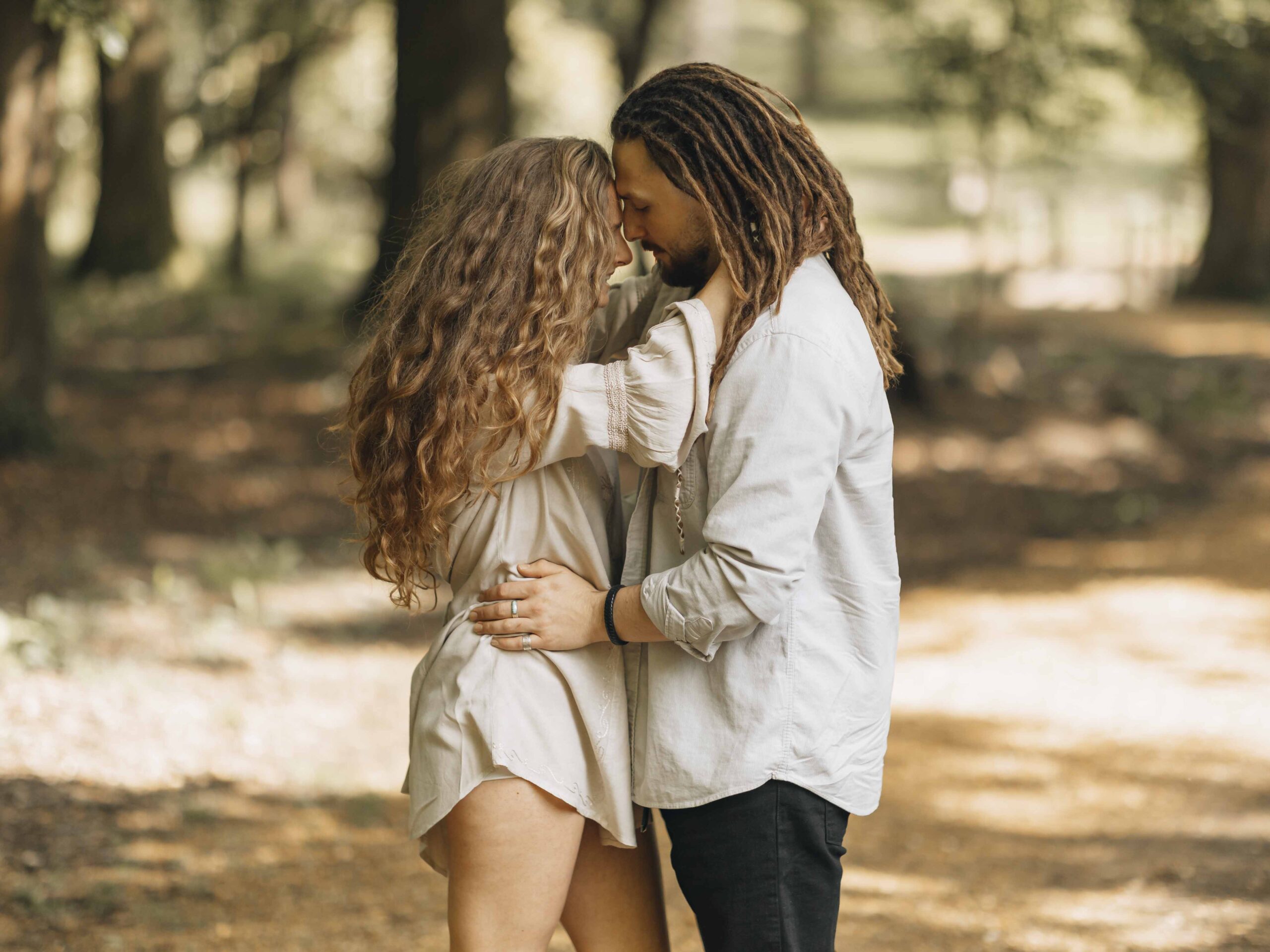 couple intimate moment in the woods